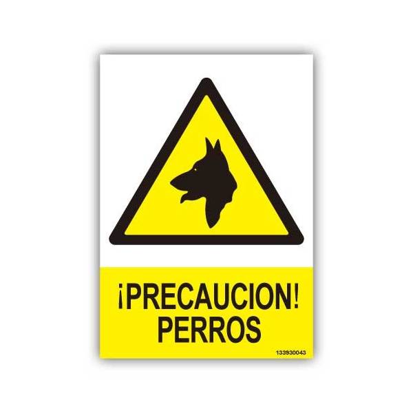 Advertencia, con pictograma y rótulo explicativos que avisa de perros guardando unas instalaciones