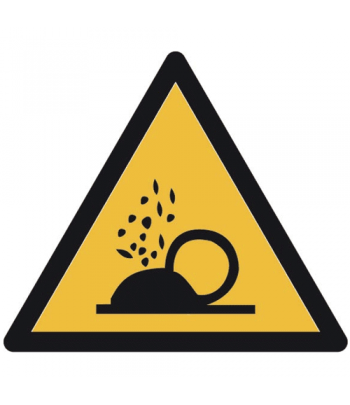 Advertencia de proyección de partículas en determinadas zonas de las instalaciones por material o maquinaria