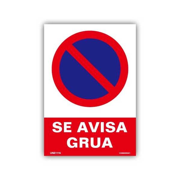 prohíbe parar o estacionar en una zona bajo de riesgo del aviso a grúa