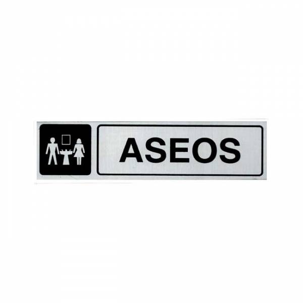Señal informativa de aluminio en formato rectangular horizontal con texto y pictograma para señalizar la zona de aseos. Señal informativa de aluminio en formato rectangular horizontal con texto y pictograma para señalizar la zona de aseos.